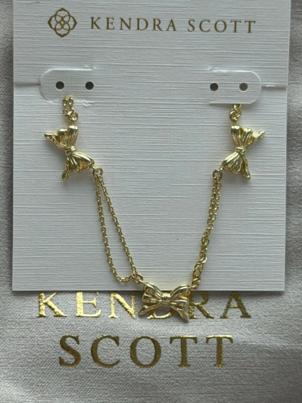 Kendra Scott gold bow necklace